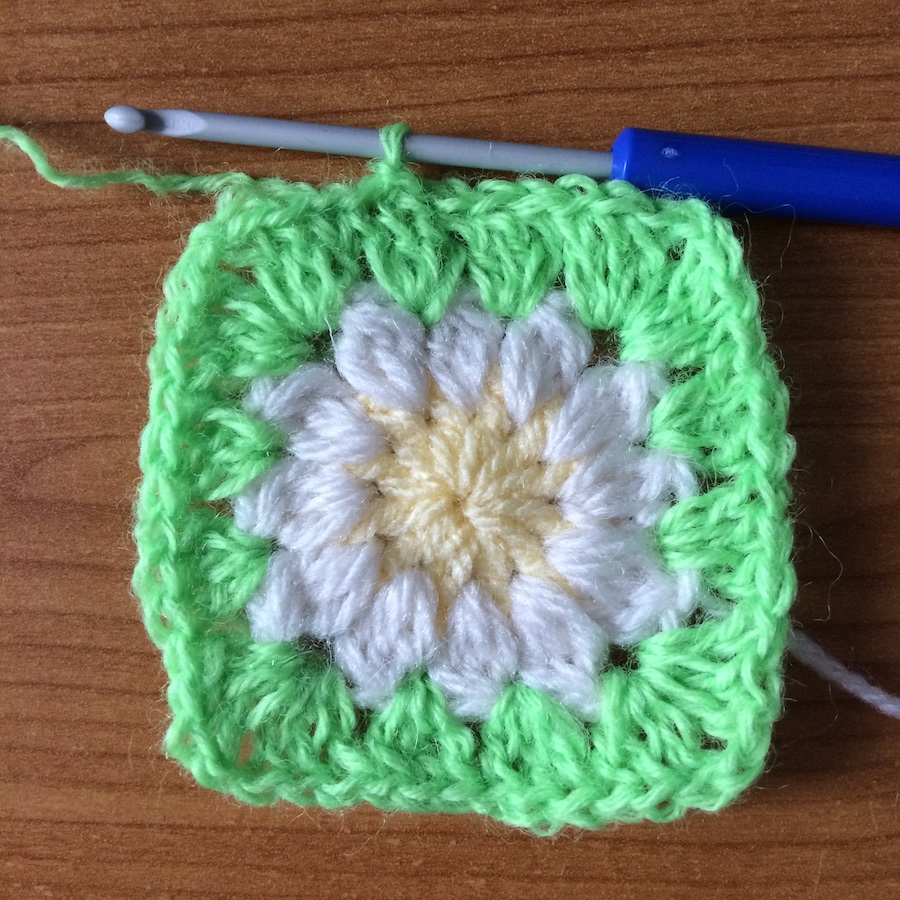Daisy granny square crocheted with old yarn